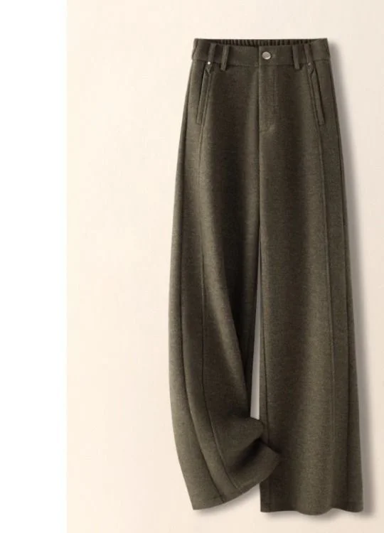 Brushed Wool-Blend Trouser — A pair of wide-leg brushed wool trousers in olive green, laid flat against a pale ground