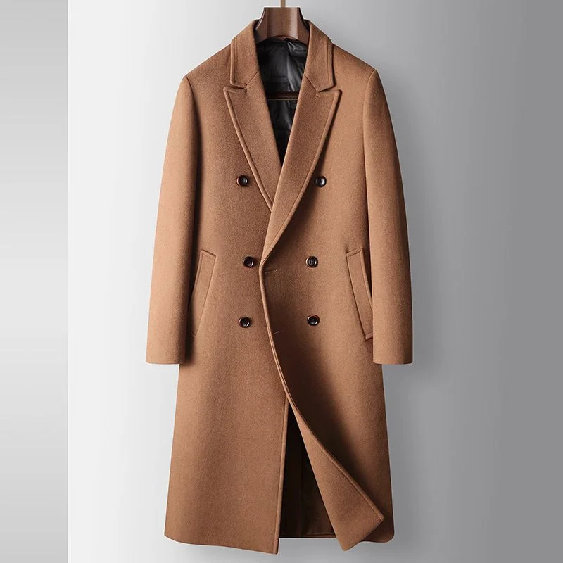 Down-Lined Wool Overcoat — A long double-breasted overcoat with a wide peak lapel and a quilted down liner, shown in camel, black, grey and blue-grey