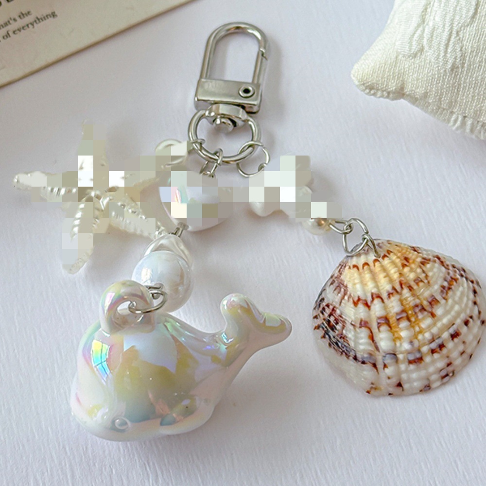 Ocean Bead Bag Charm — Ocean-inspired beaded bag charm with shell-look and pearl-look accents