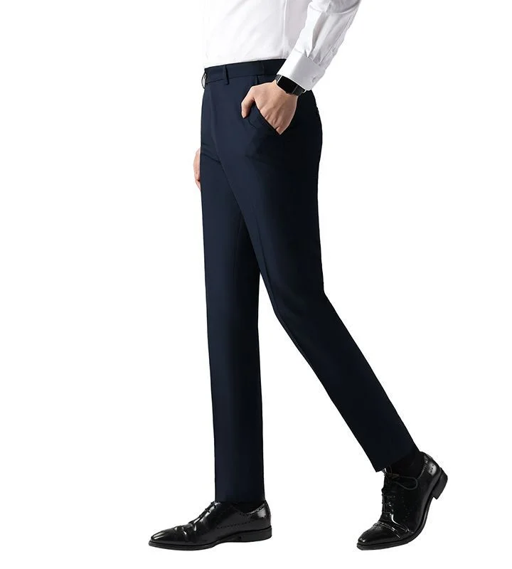 Wool-Drape Suit Trouser — A straight wool suit trouser shown waist to shoe on a model, in navy, grey and black
